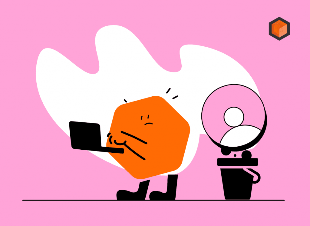 Illustration of a glum hexagon mascot hunched over a laptop beside a ring light and an empty bin